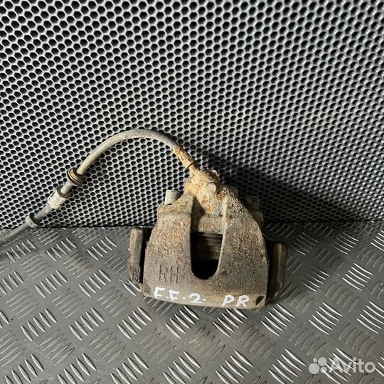 Суппорт тормозной передний правый Ford Focus