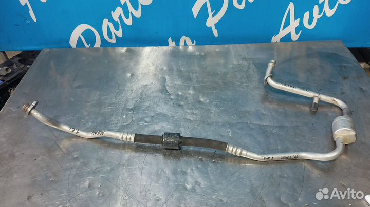 Трубка кондиционера Рено Логан