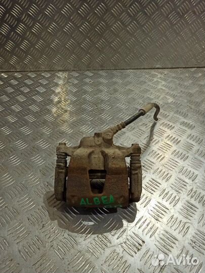 Суппорт тормозной передний правый Fiat Albea седан