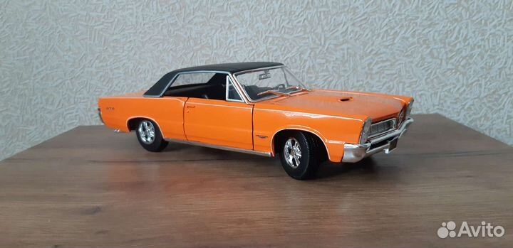Модель Pontiac gto 1965 1/18 maisto