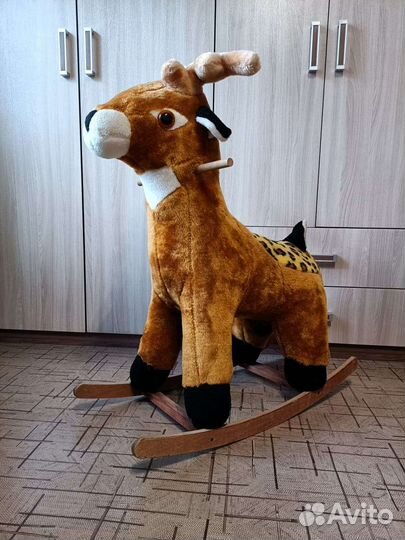 Детская игрушка качалка