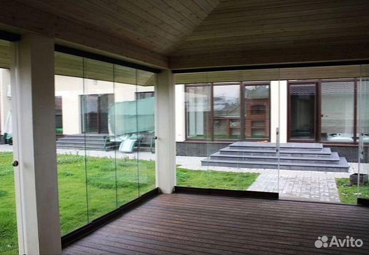 Безрамное раздвижное остекление