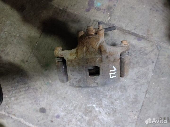 Суппорт тормозной передний левый Mitsubishi Asx