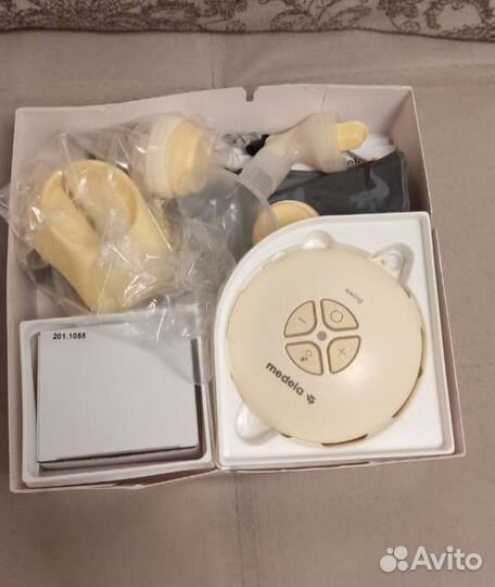 Молокоотсос medela электрический