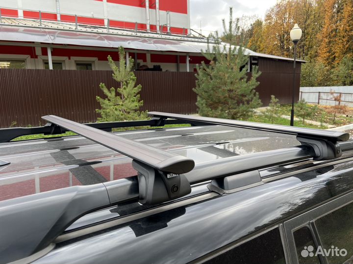 Багажник titan на рейлинги с крыловидными дугами