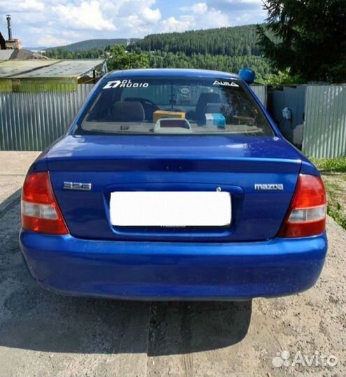 Mazda 323 1.6 МТ, 2002, 262 000 км