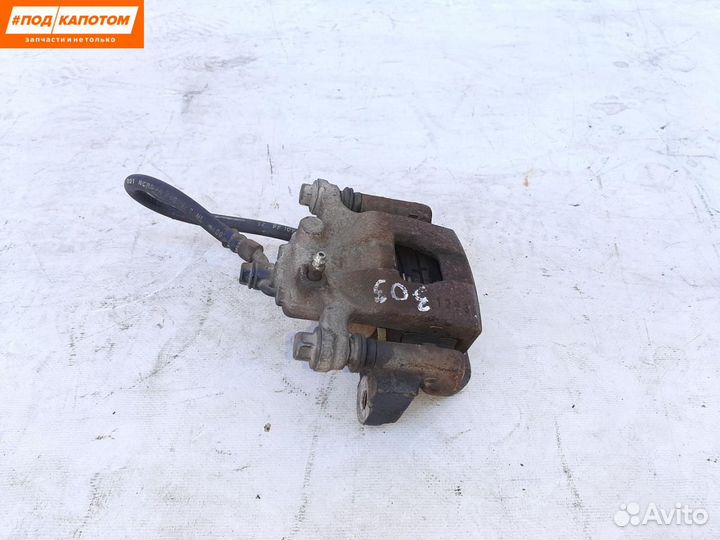 Суппорт тормозной задний правый Nissan Teana J32