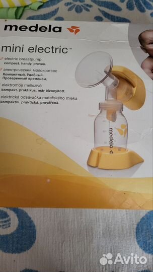 Молокоотсос medela электрический
