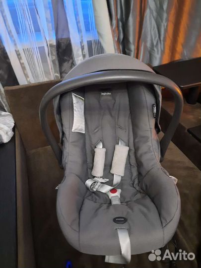 Продам детскую автолюльку и комбинезон