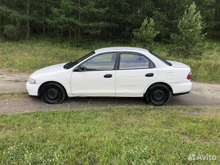 Mazda Familia 1.5 AT, 1997, 360 000 км