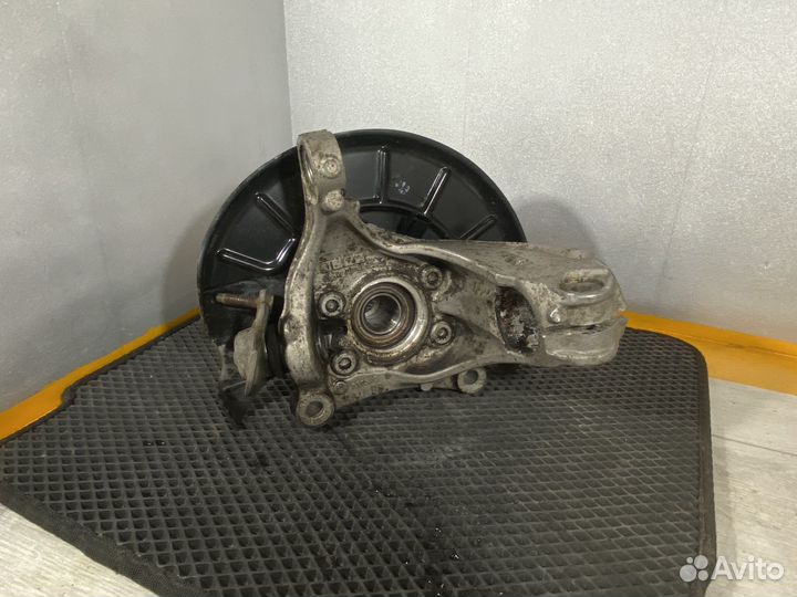 Поворотный кулак левый VW passat cc