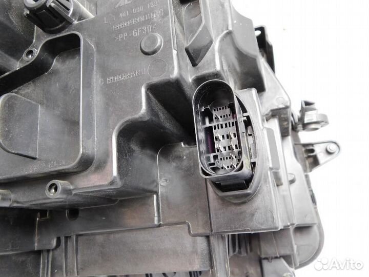 Фара левая Volkswagen Tiguan