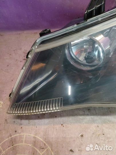 Фара галогеновая левая Mitsubishi Outlander Xl