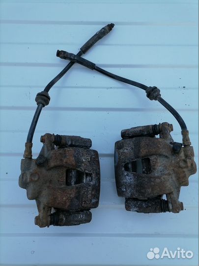 Передние тормозные суппорта Опель Корса Д