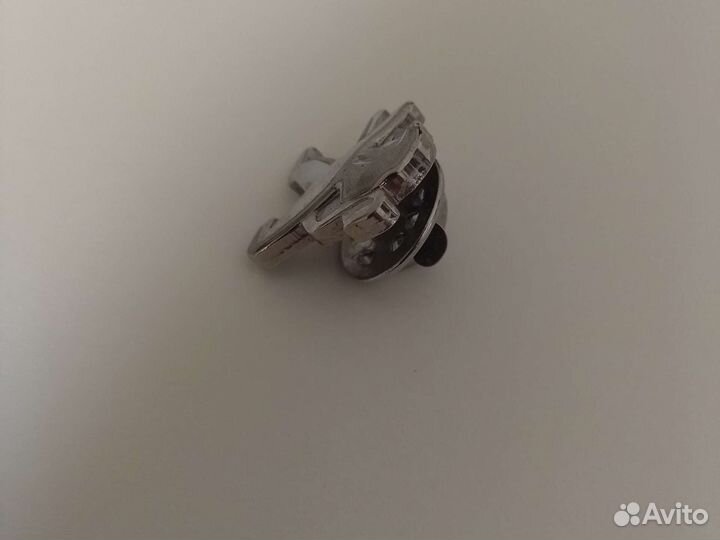 Пежо значок