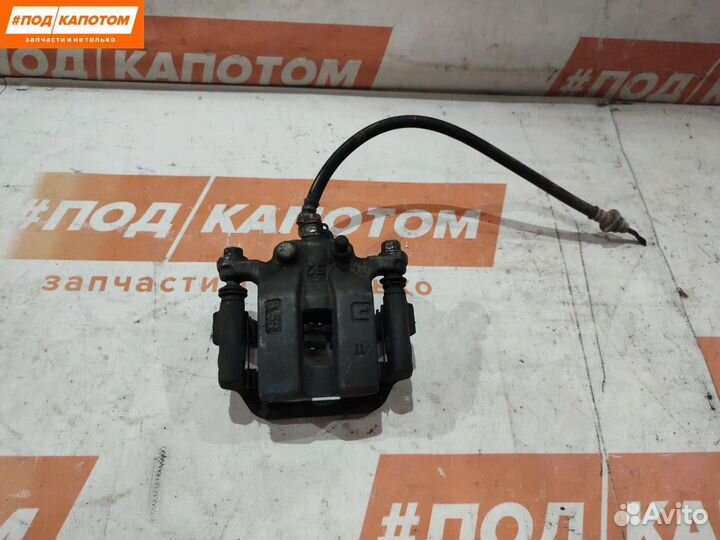 Суппорт тормозной задний левый Suzuki Grand Vitara