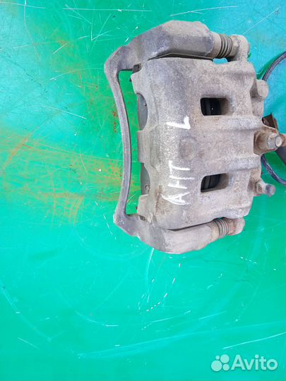 Суппорт тормозной передний Opel Antara