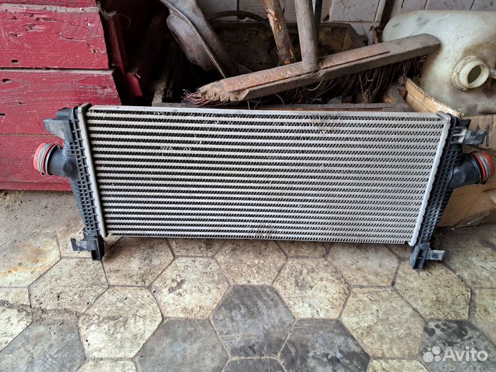 Радиатор интеркулера Opel Astra J