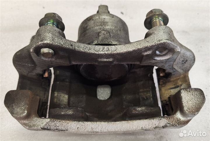 Суппорт тормозной передний правый Nissan Note E