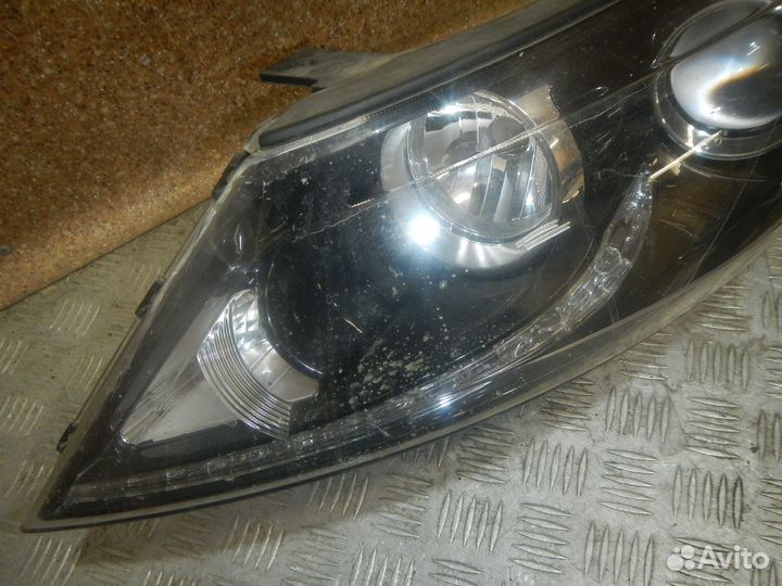 Фара левая Kia Sportage