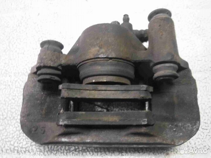 Суппорт тормозной передний правый Mazda Demio