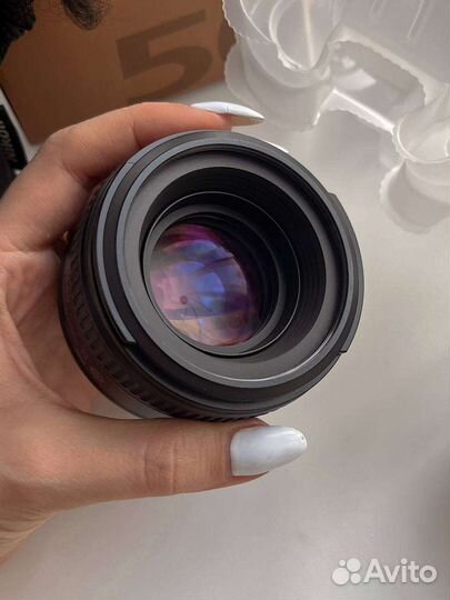 Объектив Nikkor 50mm 1.4G на гарантии