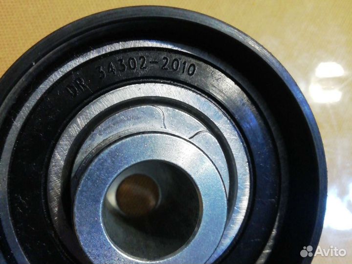 Ролик натежителя грм