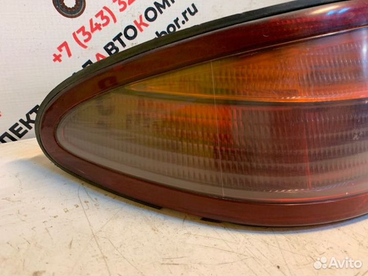 Фонарь задний левый Toyota Corolla Ceres AE100
