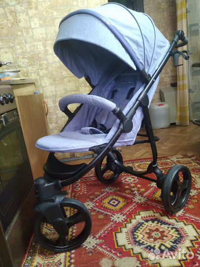 Детская прогулочная коляска babyton