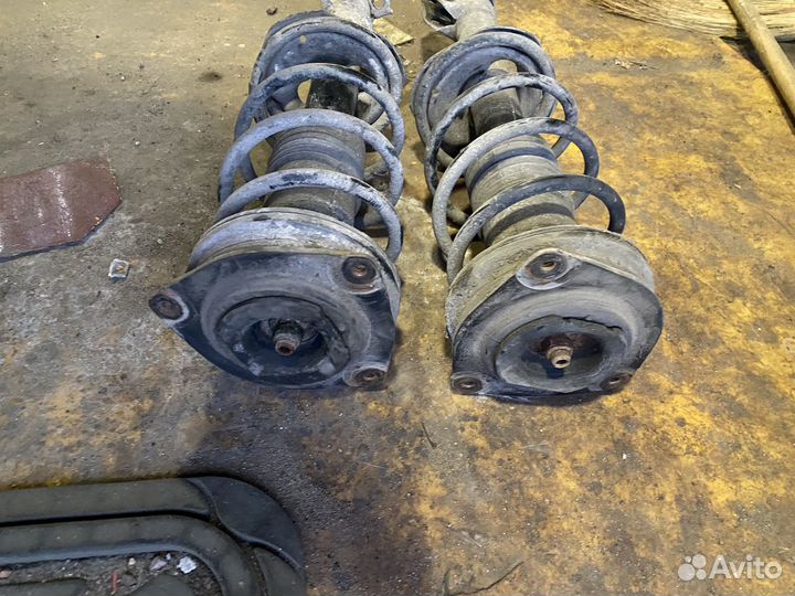 Передние стойки Nissan micra k12