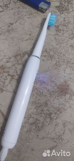 Электронная зубная щетка