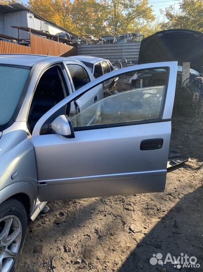 Дверь передняя левая Opel Astra G