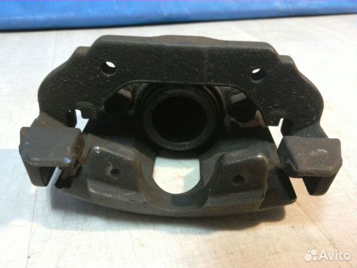 Суппорт тормозной передний левый Ford Fiesta