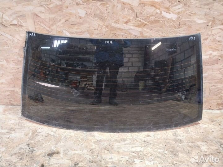 Стекло заднее Mitsubishi Lancer 9