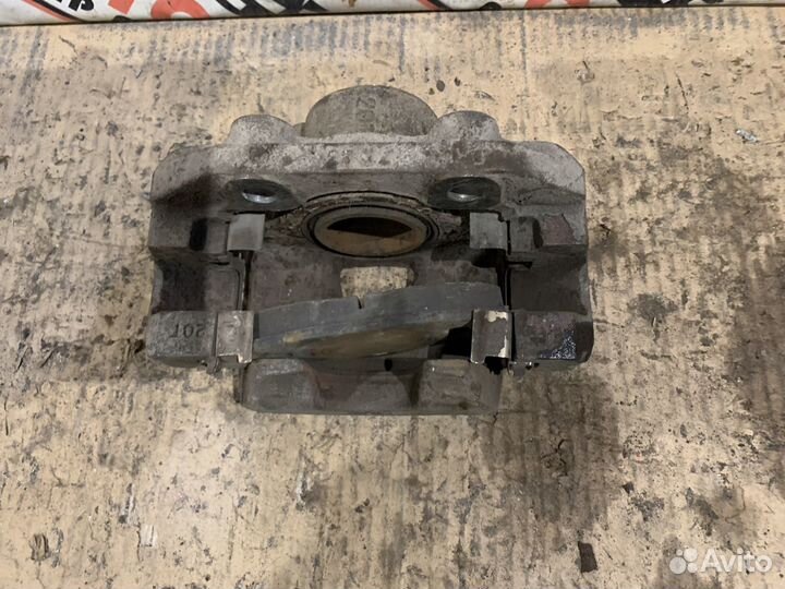 Суппорт передний левый правый Chevrolet Lanos