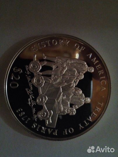 Монета 20 долларов либерия 2000г