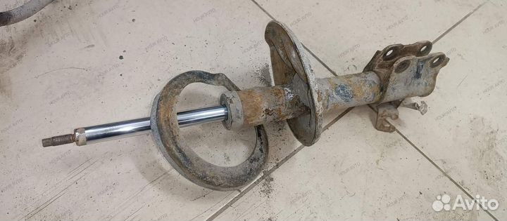 Амортизатор передний левый Mitsubishi Lancer 9