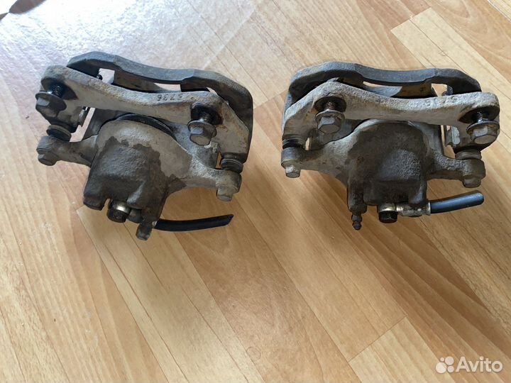 Передние Оригинальные Суппорта тормозной lancer x