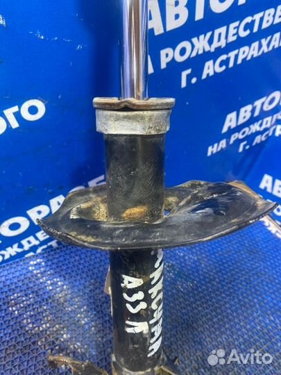 Передняя левая стойка амортизатора Nissan Maxima