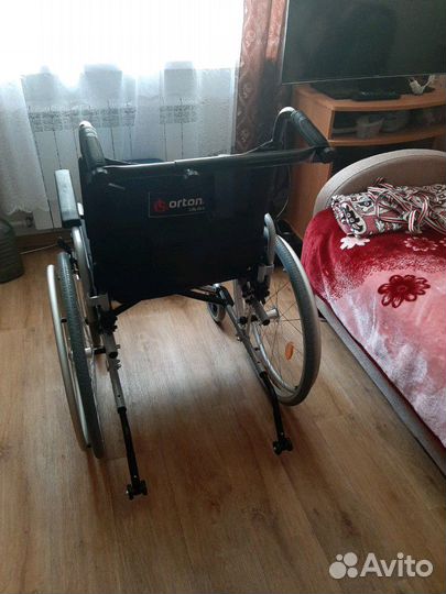 Коляска инвалидная:ортоника