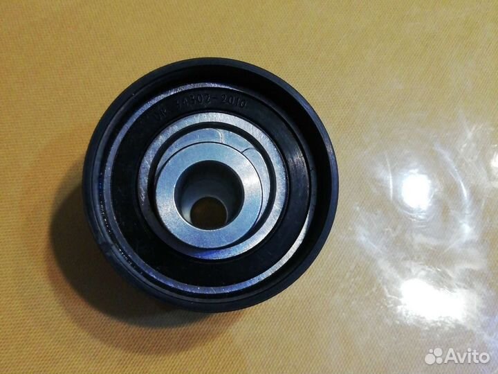 Ролик натежителя грм