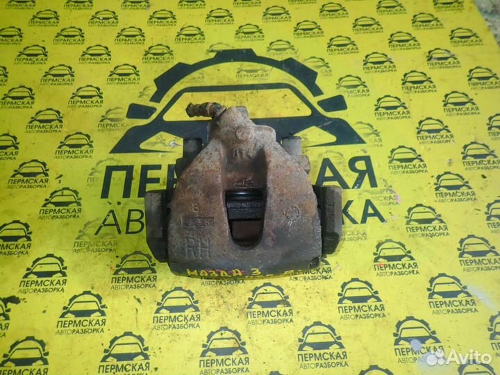 Суппорт передний правый Mazda 3 BL