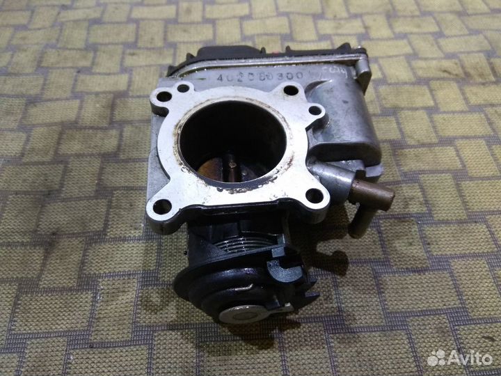 Дроссельная заслонка VW Golf4/1.4,VAG 030133064F