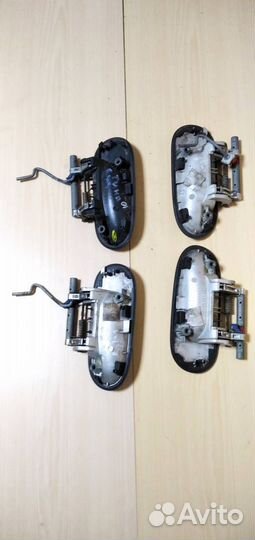 Ручка наружная двери Nissan Almera Tino V10