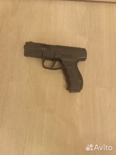 Игрушечный пистолет