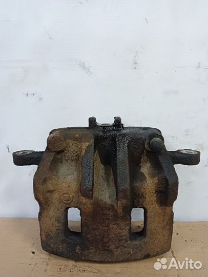 Суппорт тормозной передний Ssangyong Actyon Sports