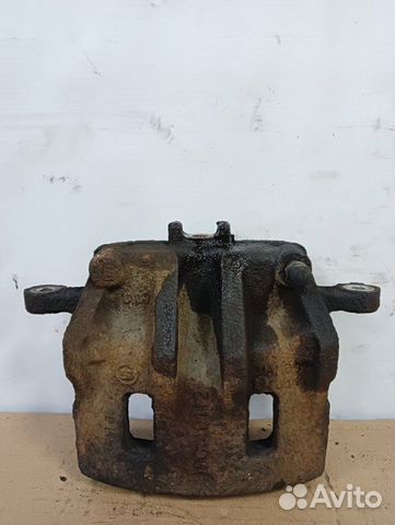 Суппорт тормозной передний Ssangyong Actyon Sports