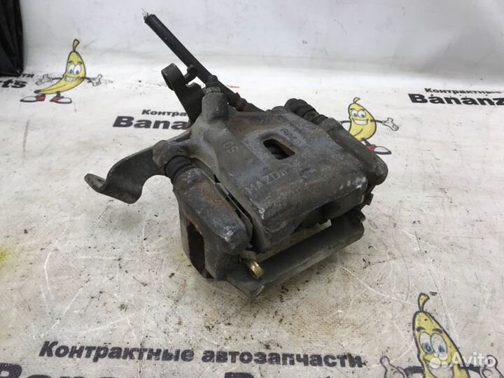 Суппорт тормозной задний левый Mazda Cx-5 KE