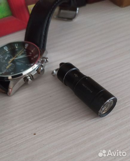 Компактный,яркий, наключный фонарик Fenix UC02