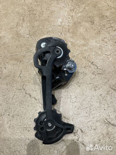 Задний переключатель Shimano Deore 9 скоростей